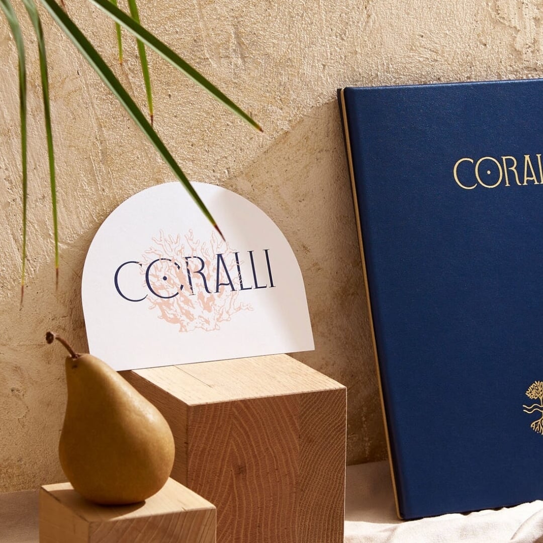 Brand identity for a Mediterranean-Caribbean beachfront restaurant 
